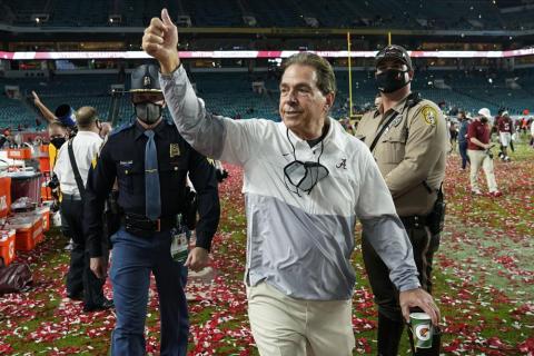 Alabama head coach Nick Saban leaves the field after the Crimson Tide’s win over Ohio State in the College Football Playoff national championship game on Jan. 12 in Miami Gardens. Another college football season will start with everyone chasing the Tide. Alabama is No. 1 in The Associated Press Top 25 preseason college football poll released on Aug. 16. (AP FILE)