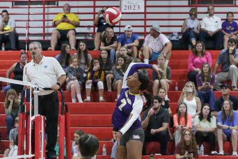 Columbia middle blocker Brandi Oliver sends a shot over the net against Fort White on Thursday night. Oliver finished with a team-high seven kills. (BRENT KUYKENDALL/Lake City Reporter)