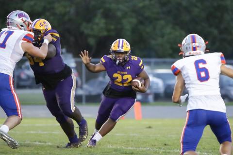 Columbia running back Tony Fulton looks for running room against Bolles on Friday night. (BRENT KUYKENDALL/Lake City Reporter)
