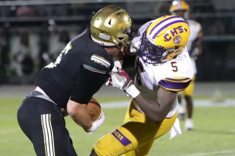 Columbia linebacker Jaden Robinson makes a tackle against Oakleaf on Sept. 10. (BRENT KUYKENDALL/Lake City Reporter)