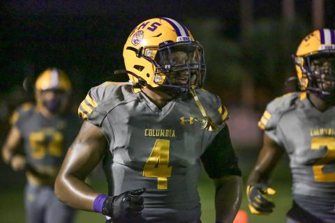 Columbia running back Jaelin Brown jogs off the field after scoring a touchdown against Englewood on Sept. 17. (BRENT KUYKENDALL/Lake City Reporter)