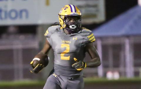 Columbia receiver Marcus Peterson runs up the field after a catch against Englewood on Sept. 17. (BRENT KUYKENDALL/Lake City Reporter)