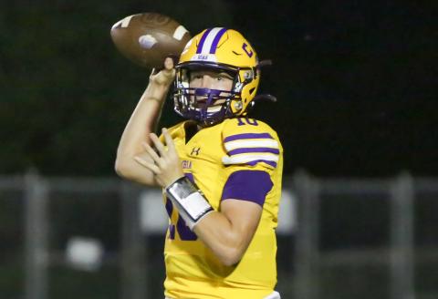 Columbia quarterback Kade Jackson drops back to pass against Trinity Christian on Sept. 24 (BRENT KUYKENDALL/Lake City Reporter)