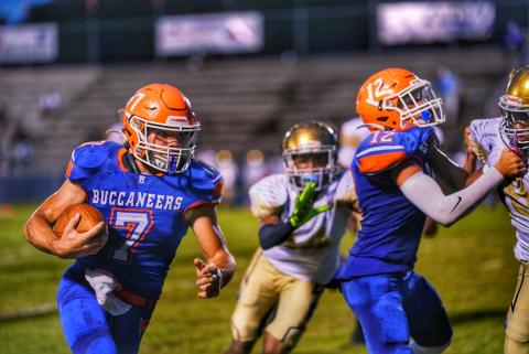Branford running back Bodhi White takes a carry up the field against Zarephath Academy on Friday night. (BRIAN LEWIS/Special to the Reporter)
