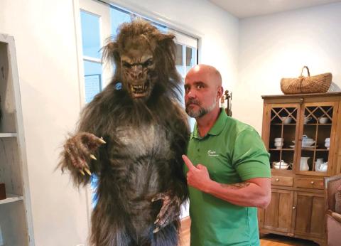 Todd Denmark poses with his new custom-made werewolf costume, set to debut Friday night at the Restless Slumber Cemetery. (COURTESY) 