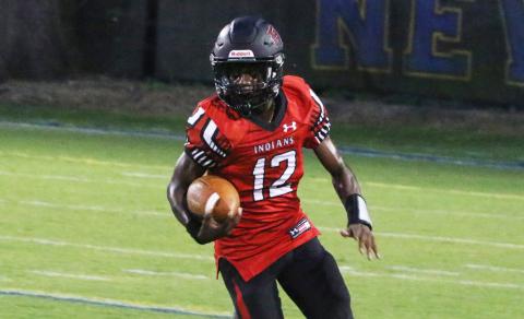 Fort White receiver Najeeb Smith rushes up the field against Newberry on Sept. 3. (MORGAN MCMULLEN/Lake City Reporter)