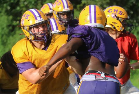 Columbia offensive lineman Caleb Pope blocks during practice on Tuesday. (JORDAN KROEGER/Lake City Reporter)