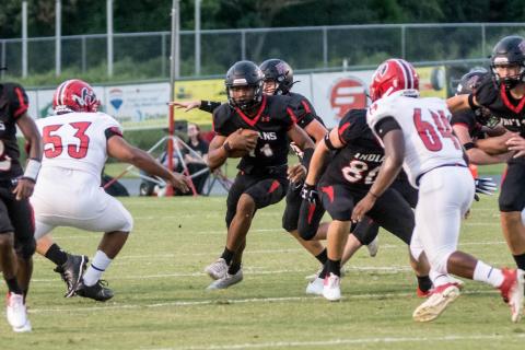 Fort White running back Davone Calhoun takes a carry up the middle against Hamilton County on Friday night. (CHRISTINA FEAGIN/Special to the Reporter)