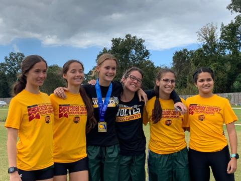 FGC women’s cross country team: Kyla Desmartin (from left), Kayla Desmartin, Ariel Anderson, Fallon Flynn, Savana Thomas and Merlin Leal. (COURTESY)