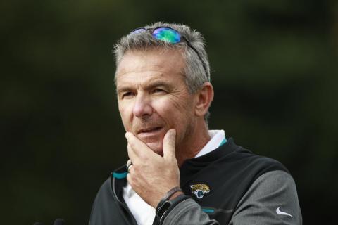 Jacksonville Jaguars head coach Urban Meyer listens to a question during a practice and media availability on Oct. 15 in Chandlers Cross, England. (IAN WALTON/Associated Press)