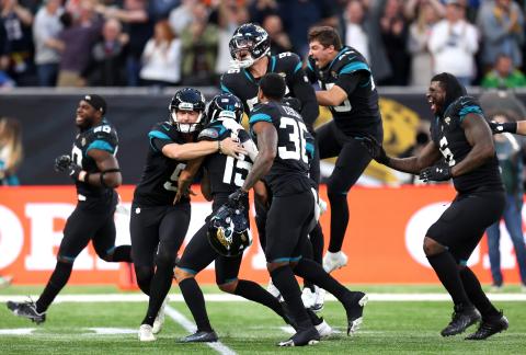Jacksonville Jaguars kicker Matthew Wright (15) celebrates with teammates after kicking the game-winning field goal against the Miami Dolphins at Tottenham Hotspur Stadium on Oct. 17 in London, England. (ALEX PANTLING/Getty Images/TNS)