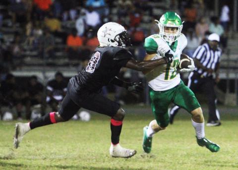 Suwannee receiver Camdon Frier runs up the field after a catch against Madison County on Friday. (PAUL BUCHANAN/Special to the Reporter)