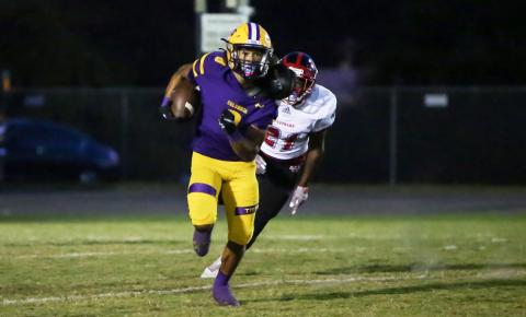 Columbia receiver Jace Hoskey runs up the field on his way to scoring a touchdown against Westside on Oct. 1. (BRENT KUYKENDALL/Lake City Reporter)
