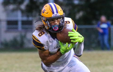 Columbia receiver Jace Hoskey pulls in a catch against Riverside on Oct. 8. (GARY LLOYD MCCULLOUGH/Special to the Reporter)
