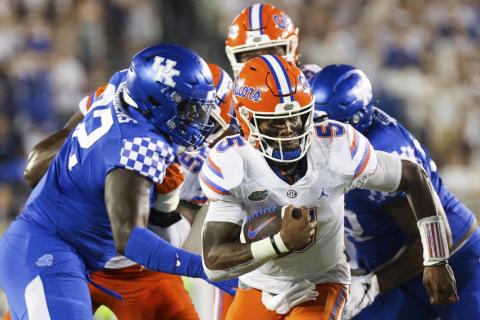 Florida quarterback Emory Jones (5) runs the ball upfield against Kentucky on Oct. 2 in Lexington, Ky. (MICHAEL CLUBB/Associated Press)