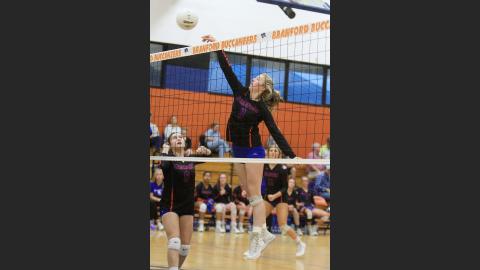 Branford hitter Madyson Sikes sends a shot over the net against Taylor County in the District 5-1A semifinals on Tuesday. (PAUL BUCHANAN/Special to the Reporter)