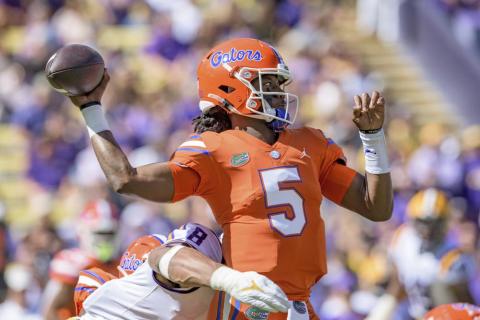 Florida quarterback Emory Jones (5) is pressured by LSU defensive end BJ Ojulari (8) on Oct. 16 in Baton Rouge, La. (MATTHEW HINTON/Associated Press)