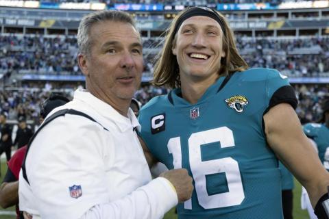 Jacksonville Jaguars head coach Urban Meyer, left, and quarterback Trevor Lawrence celebrate after defeating the Buffalo Bills on Sunday in Jacksonville. (AP Photo/STEPHEN B. MORTON/Associated Press)