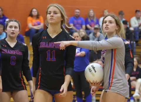 Branford libero Halleigh Ray Harris (right) questions a call during Tuesday’s Region 3-1A semifinal against Bell. (PAUL BUCHANAN/Special to the Reporter)