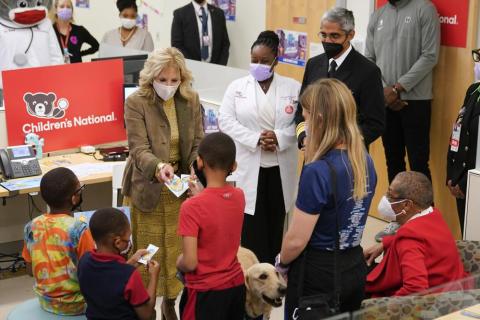 First lady Jill Biden hands out stickers to recently vaccinated children during a visit to a pediatric covid-19 vaccination clinic at Children's National Hospital's THEARC on Wednesday in Washington. (PATRICK SEMANSKY/Associated Press)