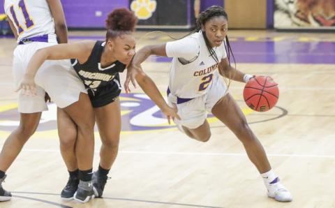 Columbia guard Na’Haviya Paxton drives to the basket against Buchholz during last season’s district championship game. (BRENT KUYKENDALL/Lake City Reporter)