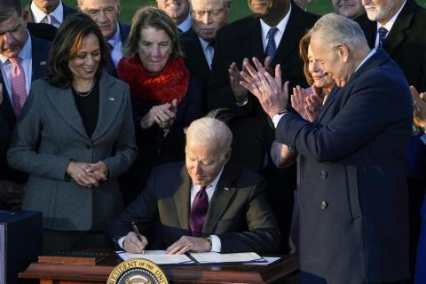 President Joe Biden signs the $1.2 trillion bipartisan infrastructure bill into law during a ceremony on the South Lawn of the White House in Washington. (SUSAN WALSH/Associated Press)