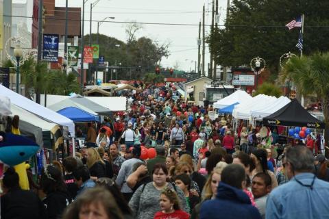 A crowd attends a previous year’s Christmas on the Square festival in Live Oak. The festival returns for the 37th year, starting Thursday and running through Dec. 4. (FILE)