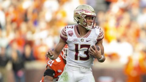 Florida State quarterback Jordan Travis runs Clemson Oct. 30 in Clemson, S.C. (HAKIM WRIGHT SR./Associated Press)