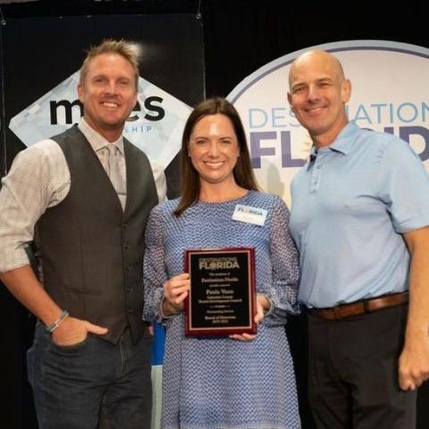 Paula Vann (middle) accepts her plaque last month. (COURTESY)