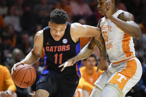 Florida forward Keyontae Johnson dribbles around Tennessee guard/forward Yves Pons on Feb. 29, 2020, in Knoxville, Tenn. (CALVIN MATTHEIS/Knoxville News Sentinel via AP File)