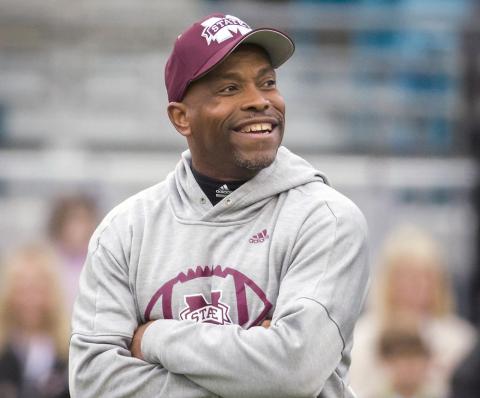  Former Mississippi State interim head coach Greg Knox watches his team warm up before the TaxSlayer Bowl against Louisville on Dec. 30, 2017, in Jacksonville. Knox is stepping in for Dan Mullen for the second time in five years. (AP FILE)