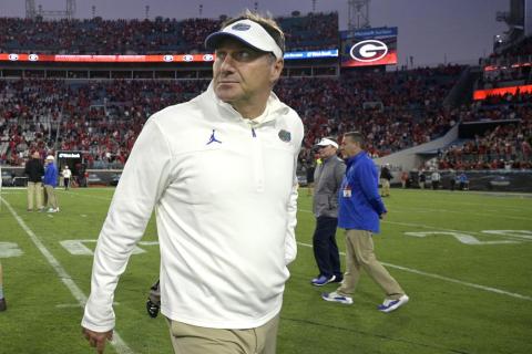 Florida head coach Dan Mullen walks off the field after a loss to Georgia on Oct. 30 in Jacksonville. (PHELAN M. EBENHACK/Associated Press)