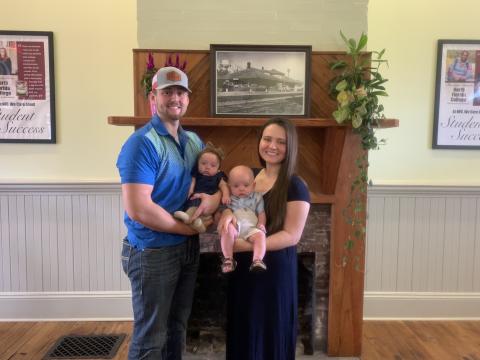 Natalie Ellis (right), pictured with her husband Jonathan and twins Adelynn and Beckham, is set to graduate from North Florida College in December. (COURTESY)