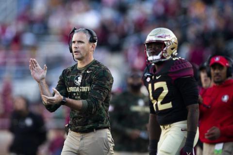 Florida State coach Mike Norvell applauds during a game against N.C. State on Nov. 6 in Tallahassee. (MARK WALLHEISER/Associated Press)