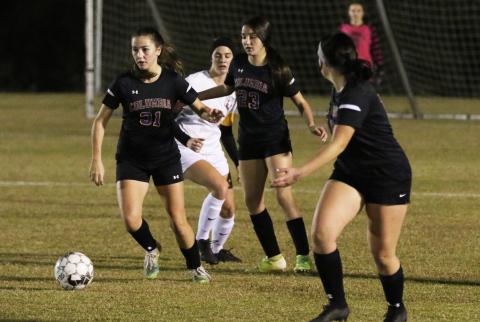 Columbia’s Sydney Rivas pushes the ball up the field against Lafayette on Monday night. (JORDAN KROEGER/Lake City Reporter)