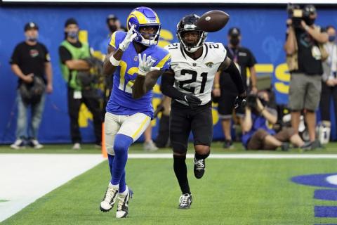 Los Angeles Rams wide receiver Van Jefferson catches a touchdown in front of Jacksonville Jaguars cornerback Nevin Lawson during Sunday’s game in Inglewood, Calif. (JAE C. HONG/Associated Press)