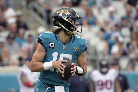 Jacksonville Jaguars quarterback Trevor Lawrence looks for a receiver against the Houston Texans on Dec. 19 in Jacksonville. (PHELAN M. EBENHACK/Associated Press)
