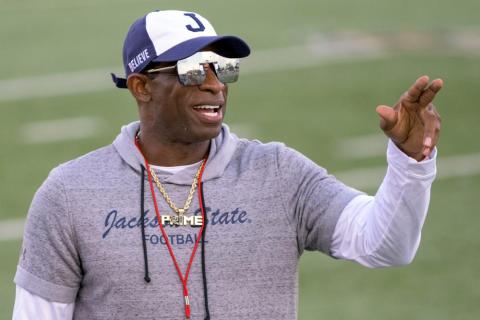 Jackson State head coach Deion Sanders points during a game against Louisiana Monroe on Sept. 18 in Monroe, La. Travis Hunter, the No. 1 high school football recruit in the country, pulled a signing day shocker on Wednesday deciding to attend Jackson State and play for coach Deion Sanders after being verbally committed to Florida State for months. (MATTHEW HINTON/Associated Press)
