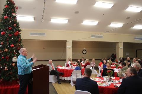Columbia Senior Services Director David Huckabee addresses the crowd at the United Way luncheon. (TONY BRITT/Lake City Reporter)
