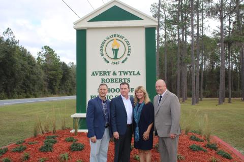 Avery and Twyla Roberts (middle) pose with FGC Foundation Executive Director Lee Pinchouck (left) and FGC President Lawrence Barrett Thursday. (TONY BRITT/Lake City Reporter)