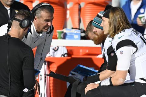 Jacksonville Jaguars head coach Urban Meyer speaks with Jacksonville Jaguars quarterback Trevor Lawrence (16) on the sideline during Sunday's game against the Tennessee Titans in Nashville, Tenn. (MARK ZALESKI/Associated Press)