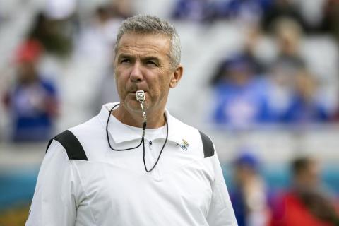 Jacksonville Jaguars head coach Urban Meyer watches his team warm up before a game against the Buffalo Bills on Nov. 7 in Jacksonville. Meyer's tumultuous NFL tenure ended after just 13 games — and two victories — when the Jacksonville Jaguars fired him early Thursday because of an accumulation of missteps. (STEPHEN B. MORTON/Associated Press)