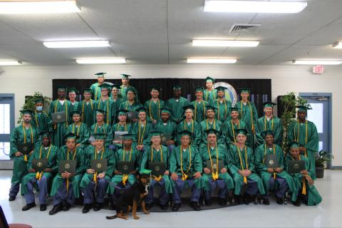 The 37 graduates from the FDC’s Second Chance Pell program display their diplomas from Florida Gateway College on Dec. 15. (COURTESY)