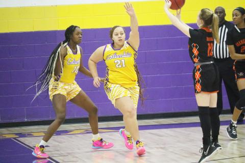 Columbia forward Amaiya Callum contests a shot against Orange Park on Jan. 13. (JORDAN KROEGER/Lake City Reporter)