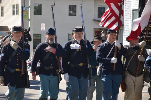 A group of Union soldiers marches past the spectators during the Olustee Festival parade in 2020. The Blue-Grey Army is not contributing to the Olustee Battle Reenactment this year and a lack of funding could mean the festival is on its last legs as well. (FILE)