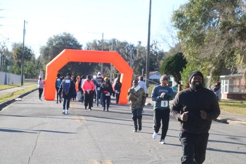 An estimated 40-60 people participated in the inaugural MLK Day 3K Walk/Run event in Lake City. (TONY BRITT/Lake City Reporter)