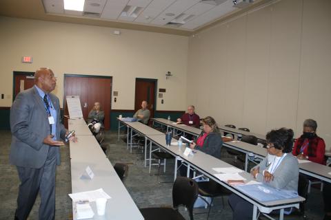 NorthStar Family Resource Center Manager Philip Mobley (left) gives a lesson on building strategies for non-profits. (TONY BRITT/Lake City Reporter)