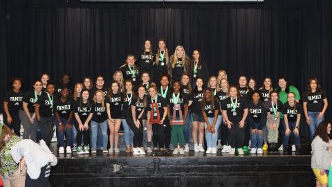 Suwannee’s girls weightlifting team poses with the Region 1-1A trophy on Friday night. (PAUL BUCHANAN/Special to the Reporter)