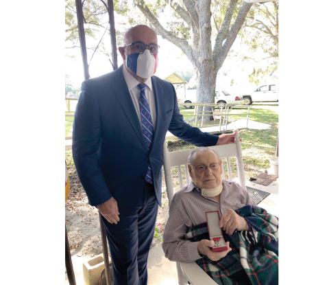 Earl Mills, a Live Oak resident and a World War II veteran who fought in Normandy, France, on D-Day, received the French Legion of Honor medal Thursday from Francois Kloc, an honorary consul of France. (COURTESY)