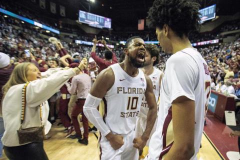 Florida State forward Malik Osborne (10) and forward John Butler (22) celebrate beating Duke 79-78 in overtime on Tuesday in Tallahassee. (MARK WALLHEISER/Associated Press)